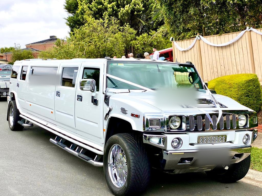 The Pearl White stretch Hummer limousine, the 14 seat car
