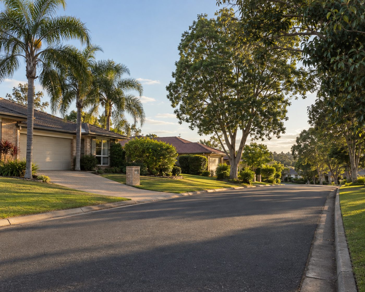 A quiet Southport street with wide driveways in the late afternoon
